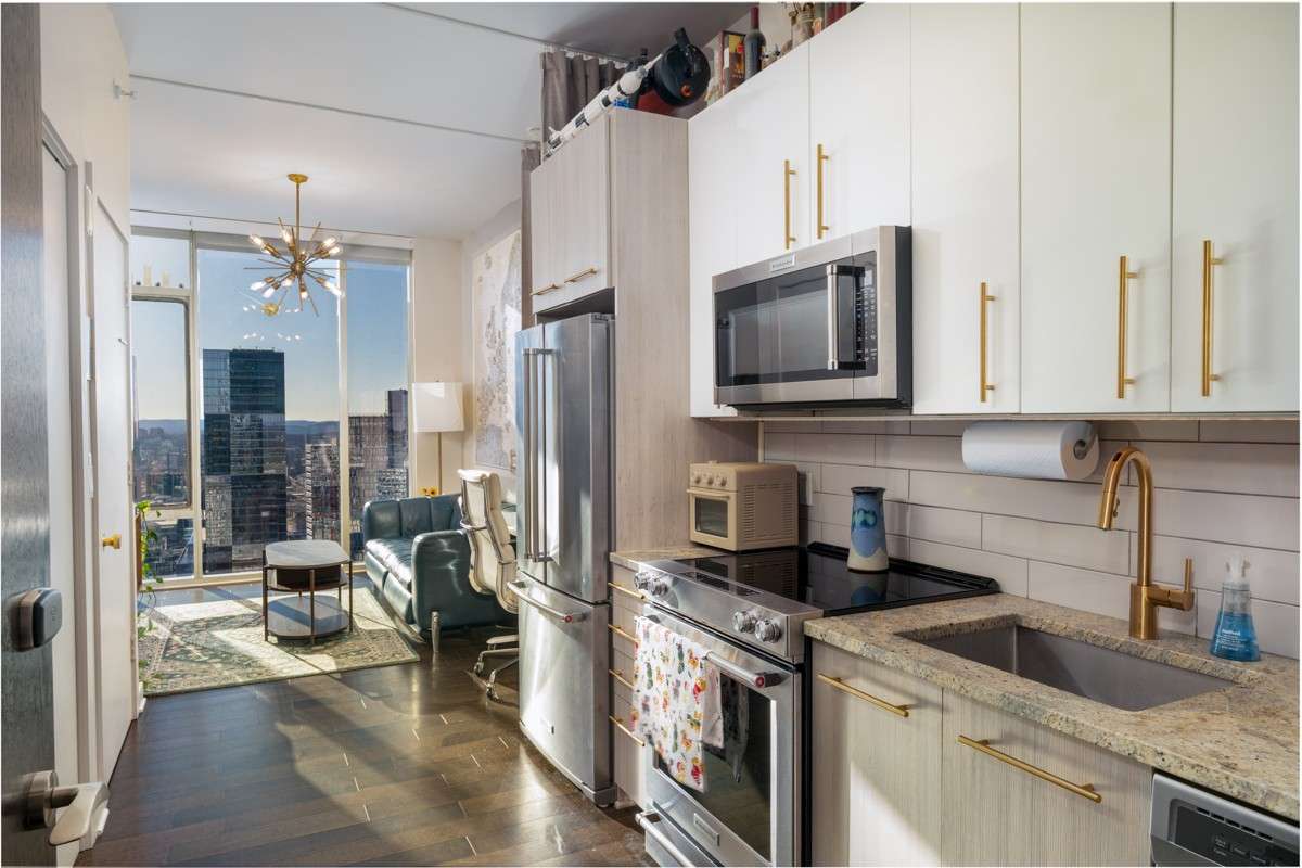 Welcome Home! Your sleek, thoughtfully designed alley kitchen maximizes efficiency without sacrificing style!