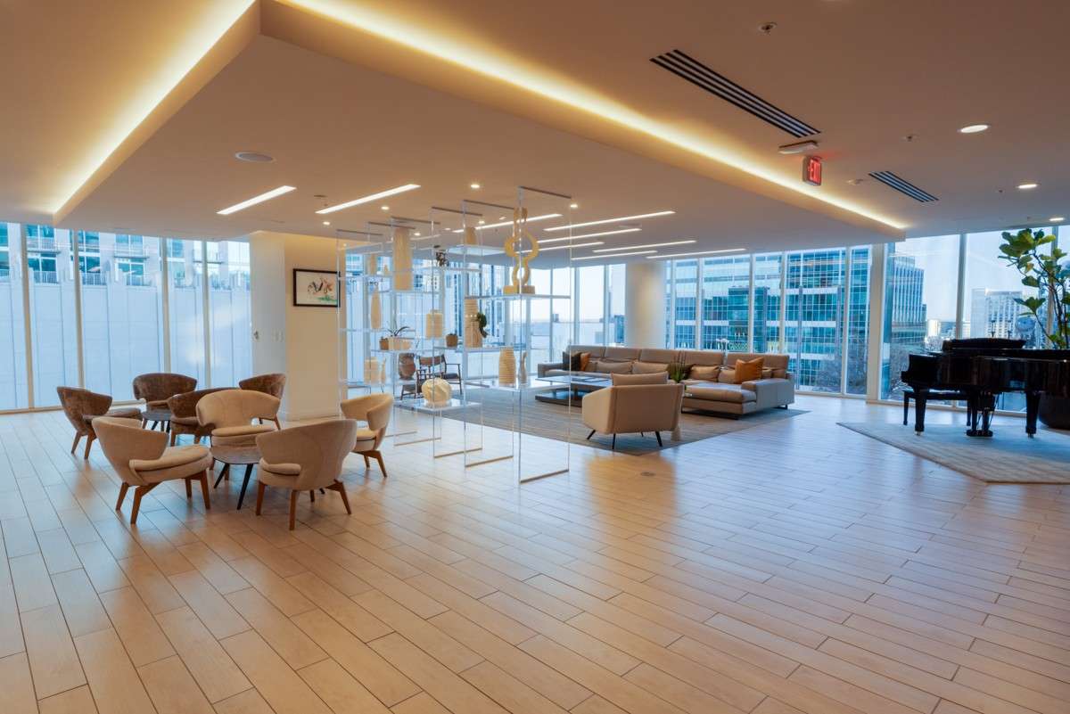 Condo owners have exclusive access to enjoy 8th floor amenities, like this spacious resident lounge to enjoy for yourself, meet up with neighbors or rent it out for a private party!