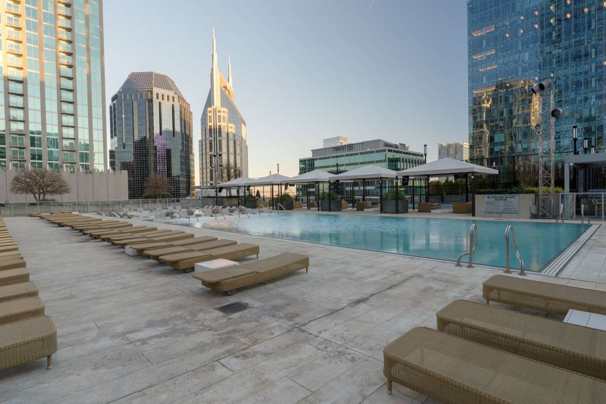 Resort-style living above the city! Enjoy a saltwater pool, sunbathing terrace, and private cabanas - perfect for relaxing afternoons, skyline views, and soaking up downtown Nashville energy!