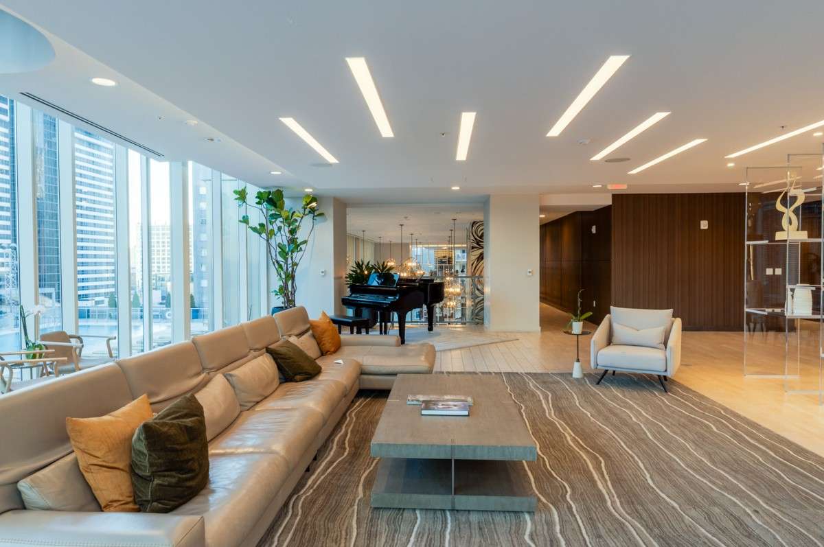 The sophisticated resident lounge highlighted by a self-playing piano, creating an elegant atmosphere for gathering and unwinding!
