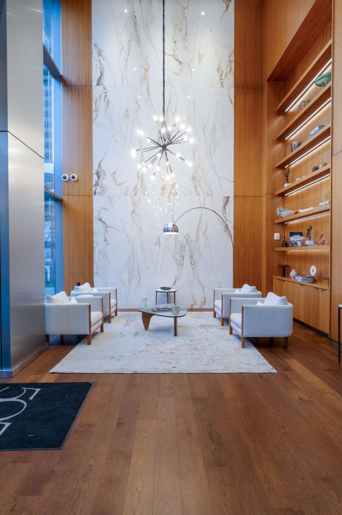 A grand entrance with soaring ceilings and 24-hour concierge service. This entry offers comfort, security, and a warm welcome home - any time of day!