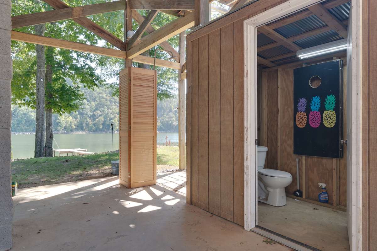 Lower level 1/2 bath, and outdoor shower