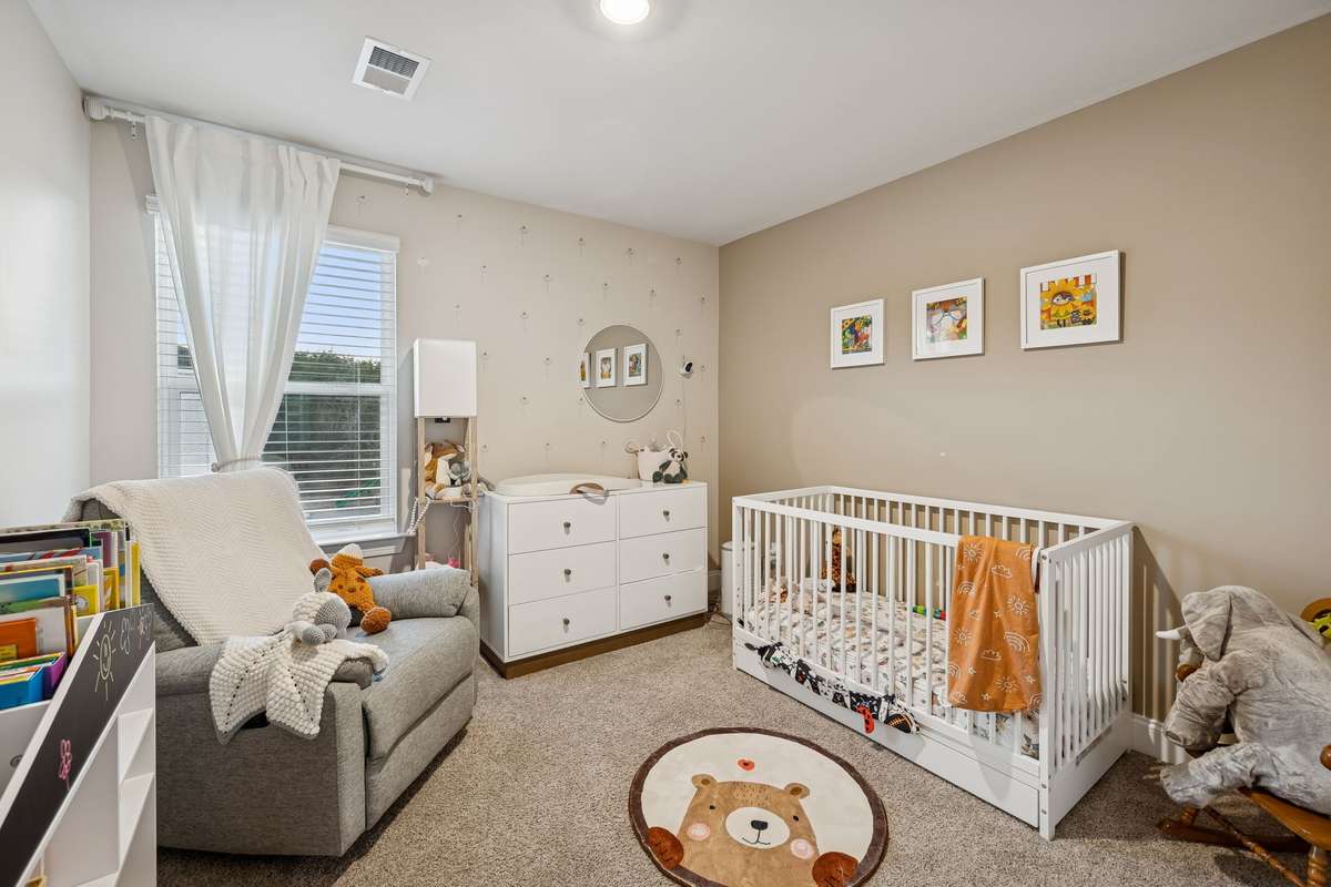 large secondary bedroom with extra-large closets