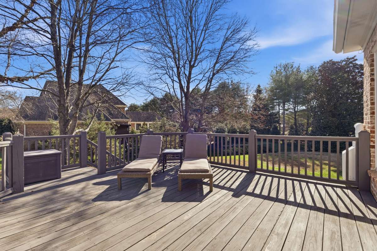 A separate deck off of the side door on main level
