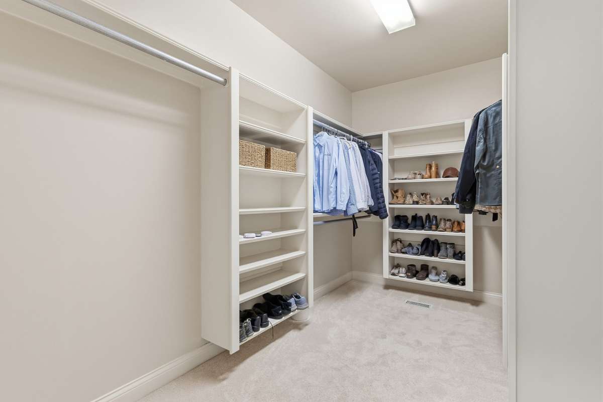 Large walk in closet in primary bedroom
