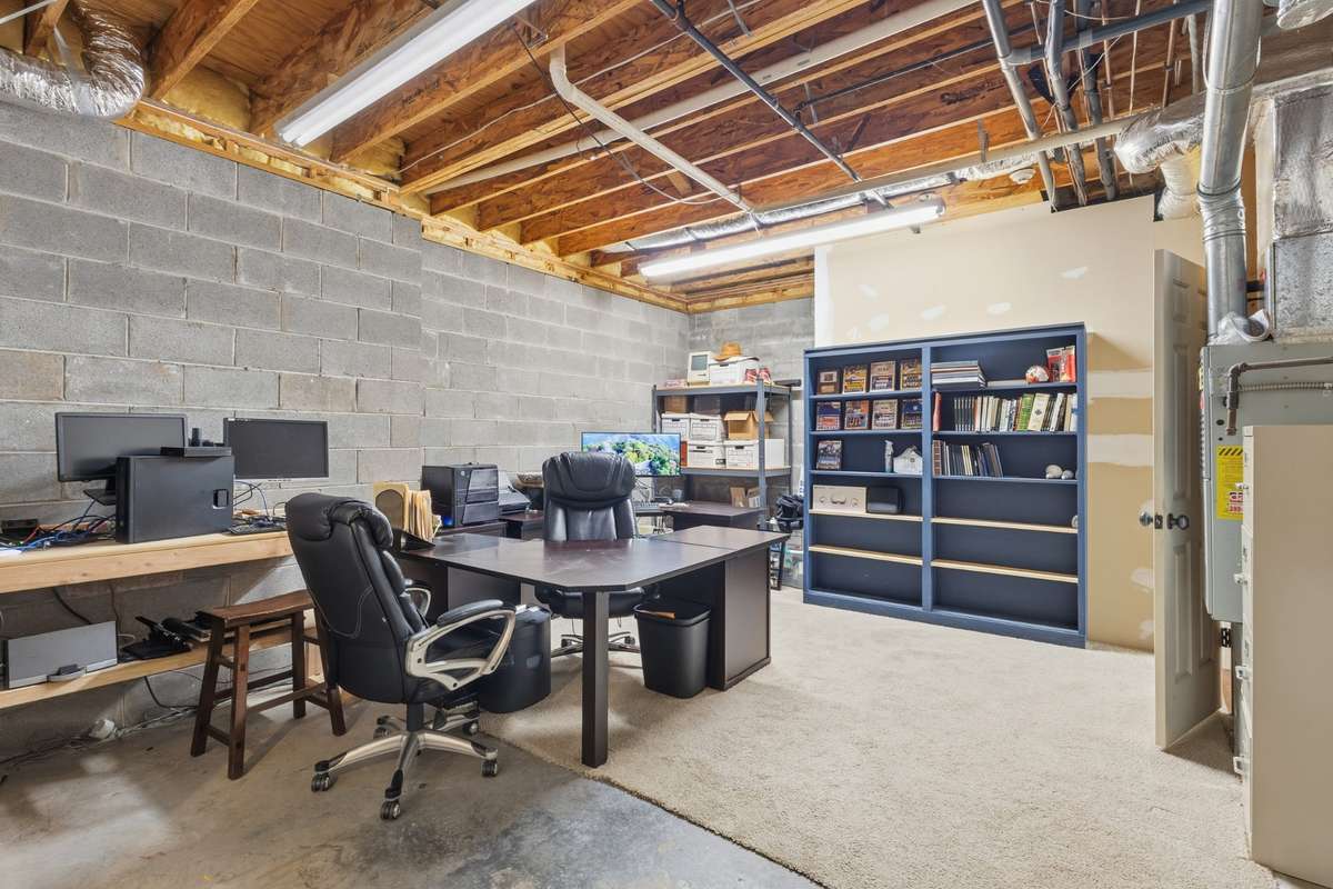 This space is not counted in the finished square footage of the home, but the seller uses it as an office.