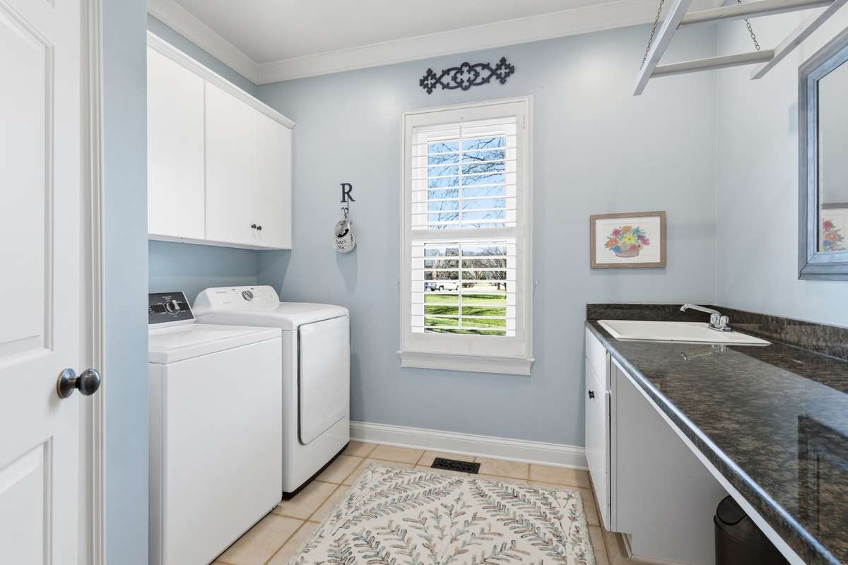 Laundry room with sink and folding counter space