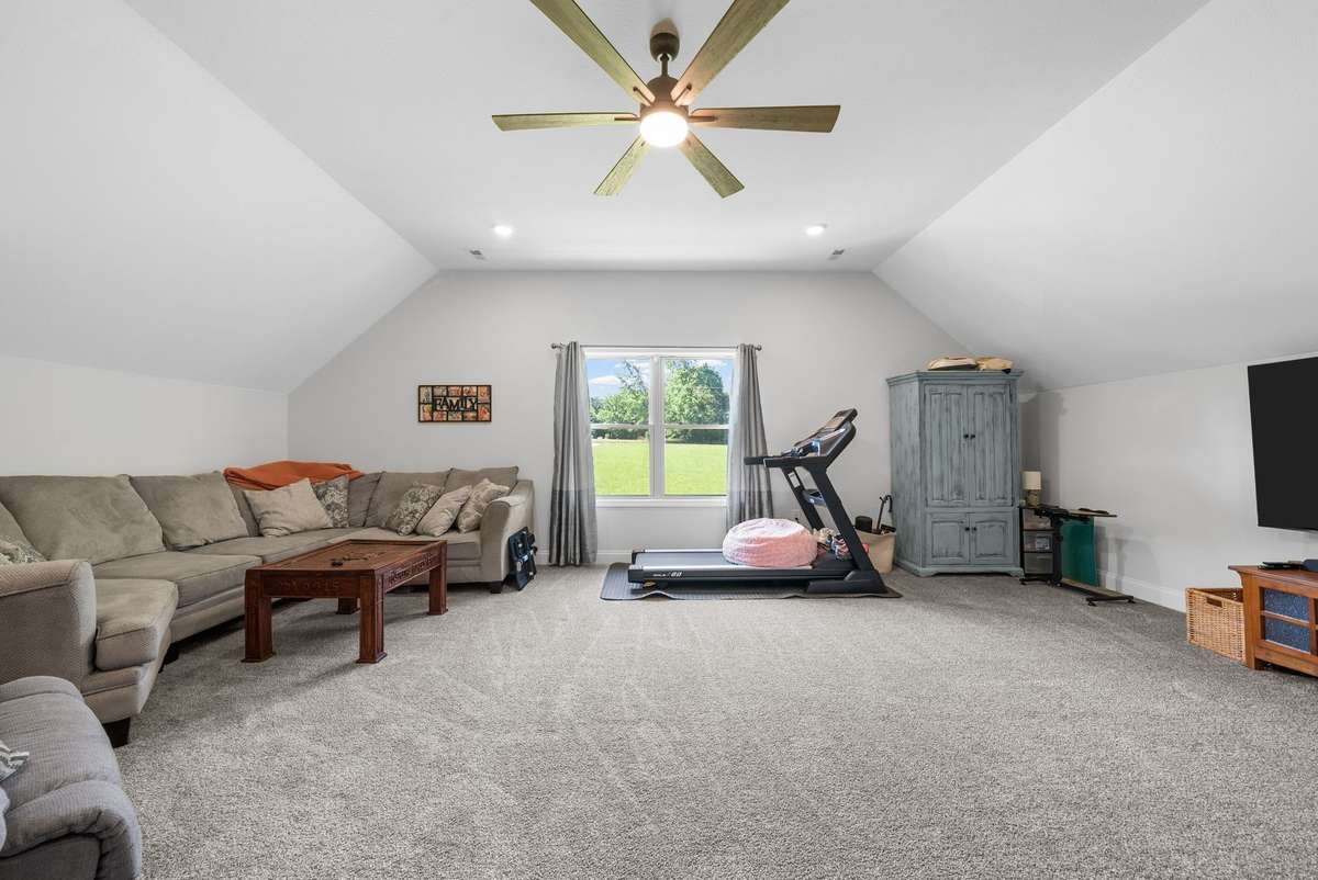 Flexible bonus room! Perfect as a 5th bedroom, office, workout room, or creative space.