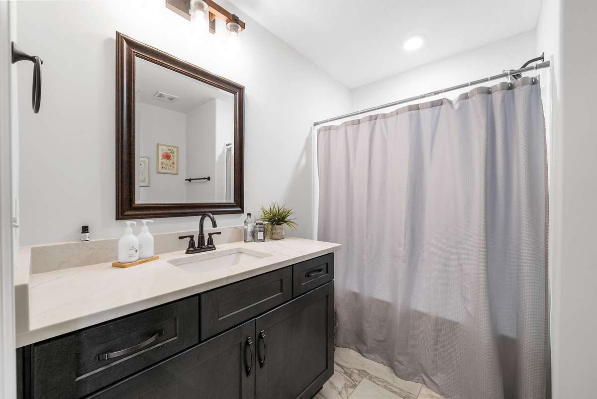 Hallway guest bathroom on second floor. There is one linen closet in this bathroom and a second linen closet directly across the hall as well.