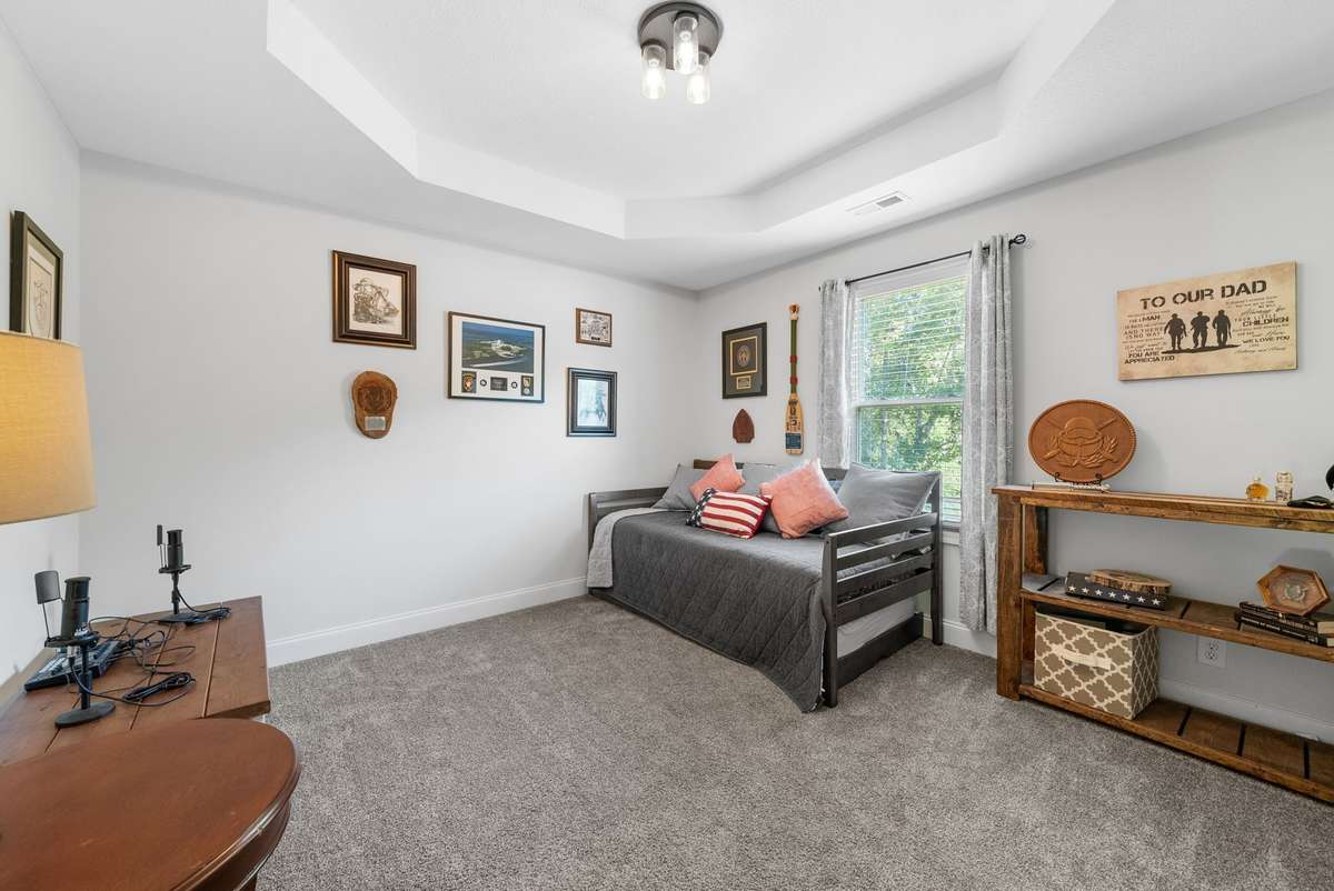 Bedroom #3 features a tray ceiling, large layout, and good closet space.