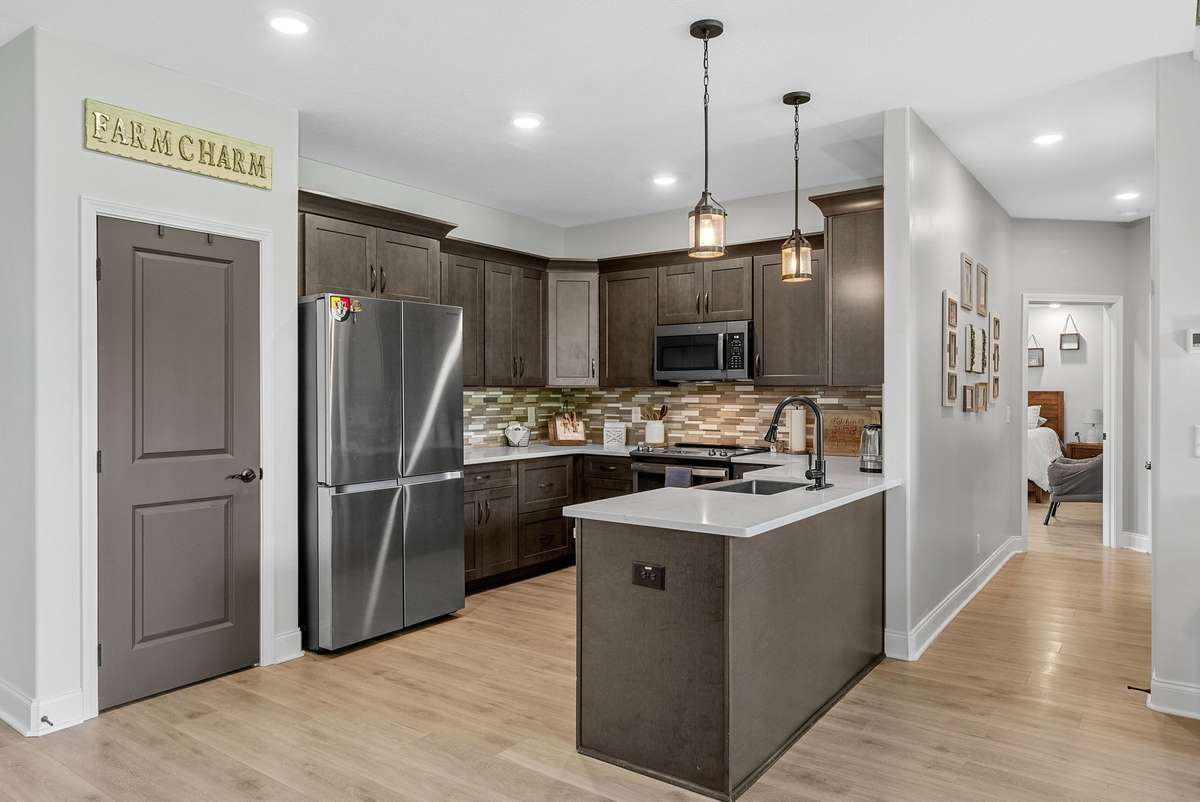 Custom cabinetry and quartz countertops perfect for entertaining!