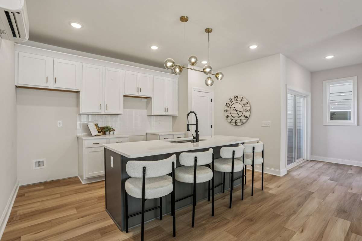 Oversized chef’s kitchen with ample storage, designed for both entertaining and daily living.