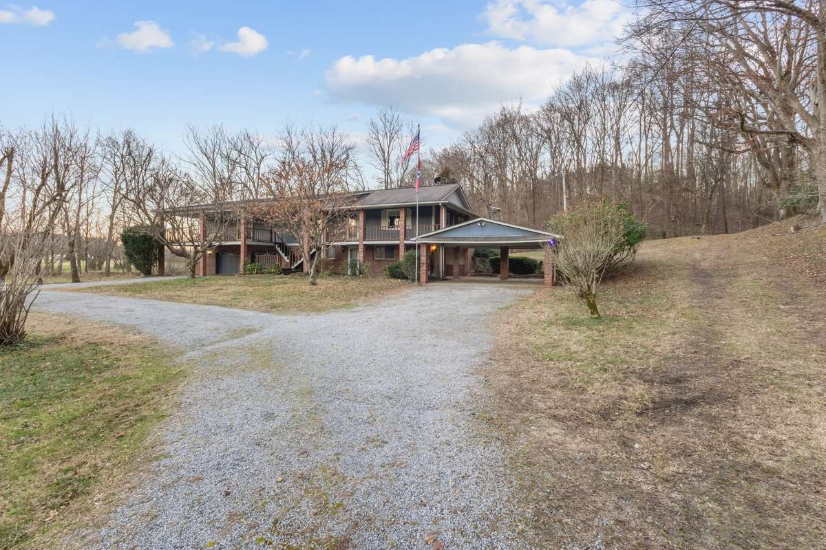 2 carport spaces on the right, 2 car garage on the left