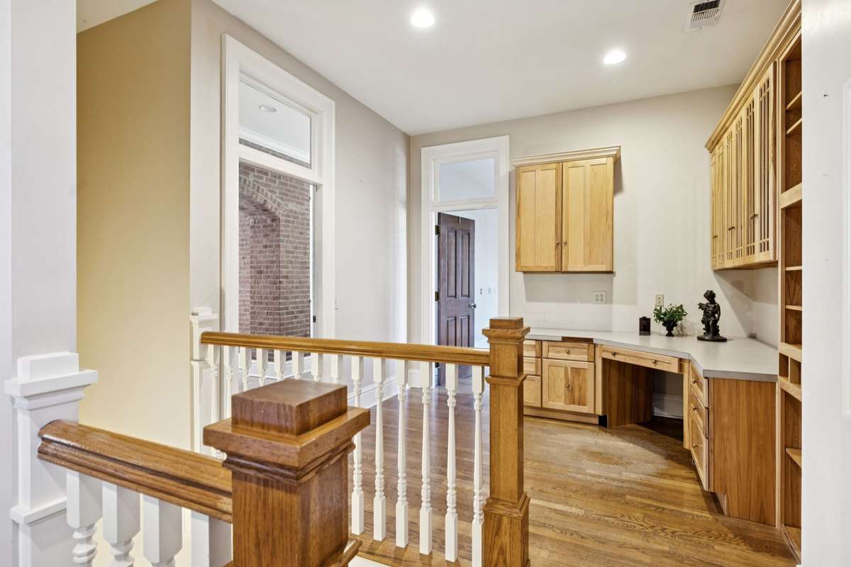 The 1,579 sq ft guest house above the garage includes 2 bedrooms, a full bath, a hobby room, a study, a kitchen, and a dining area.