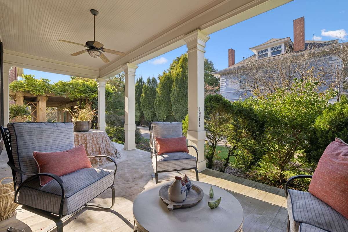 A side porch added in 1910 offers peaceful views of 3rd Avenue.