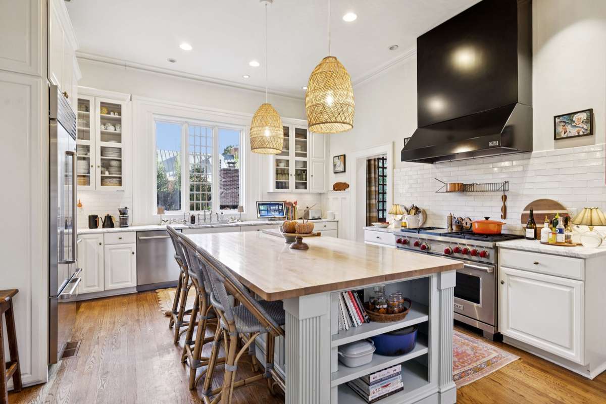 The current owners renovated the kitchen and pantry area, creating a new custom bar.