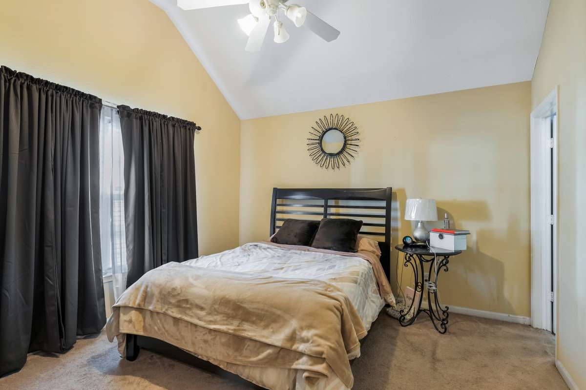 Primary Bedroom with attached Full Bathroom Suite and Walk-in Closet