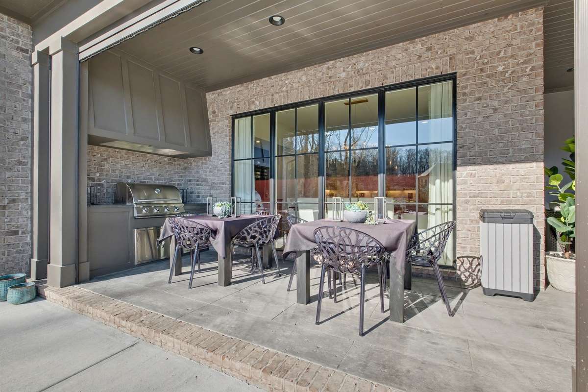 In the L-Shaped Extension of the Covered Porch is the Outdoor Grilling Area with Plenty of Space for Tables/Chairs for Eating/Gathering/Entertaining