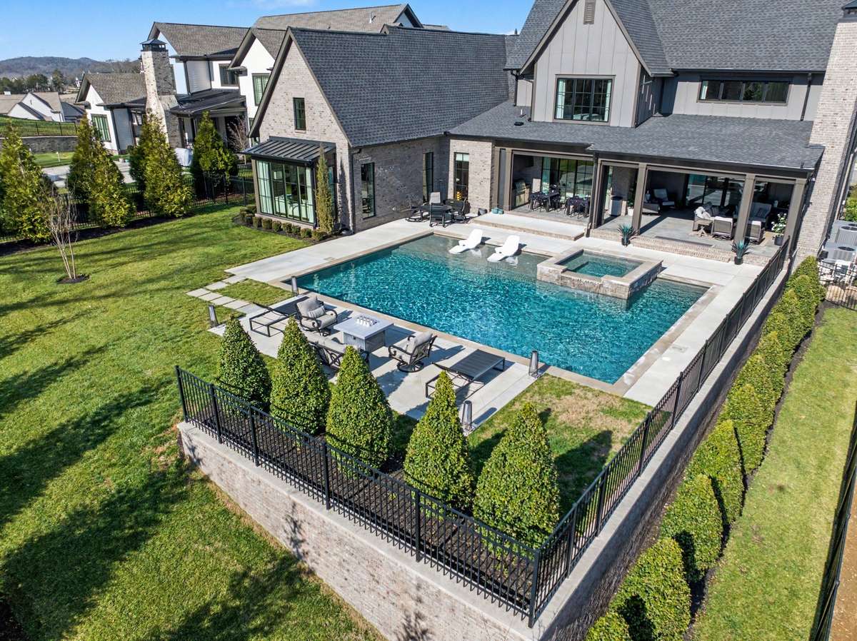 The Back Yard & Pool Area are Tastefully Landscaped for Privacy and Beauty