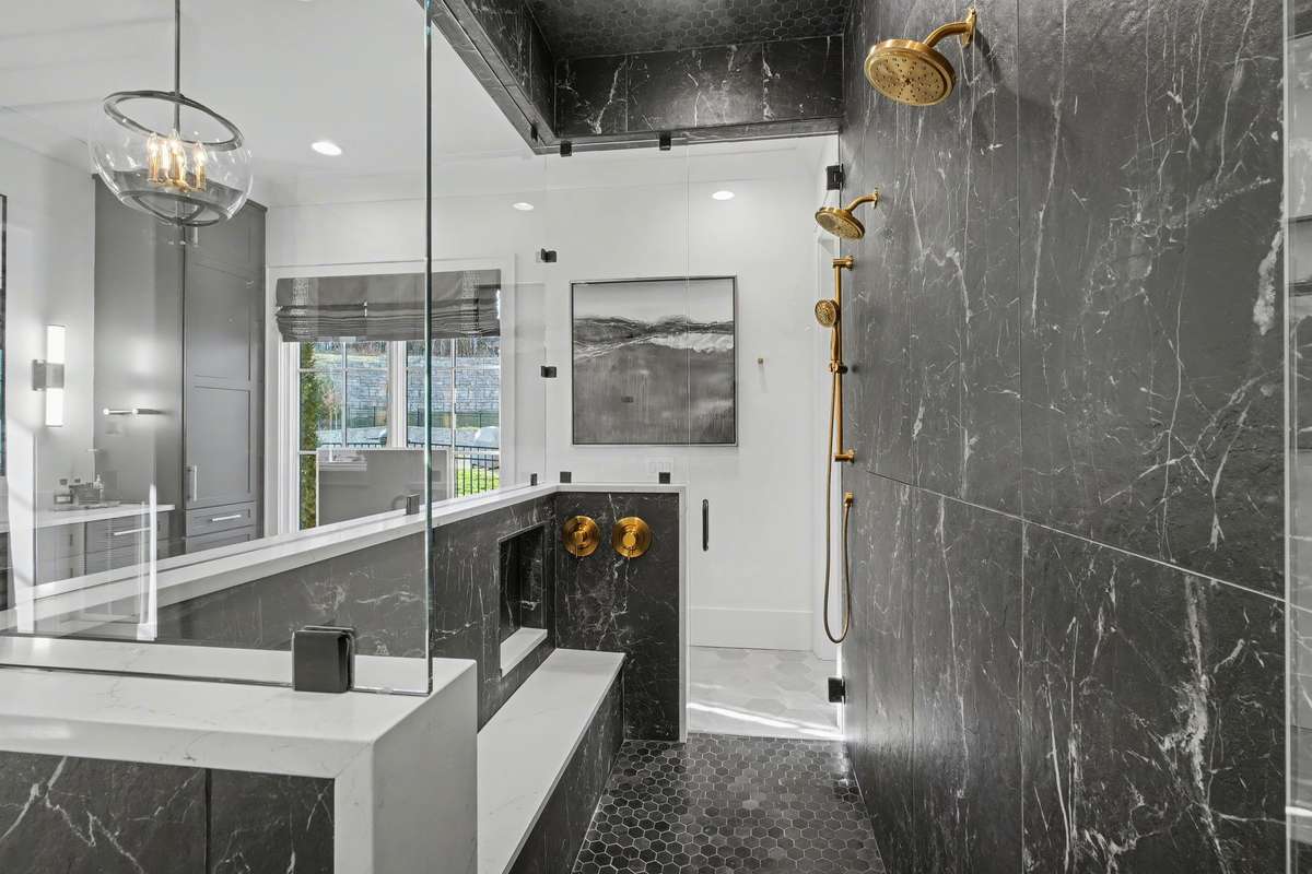 Walk-in Shower offers Entry from Either Side with Bench!!