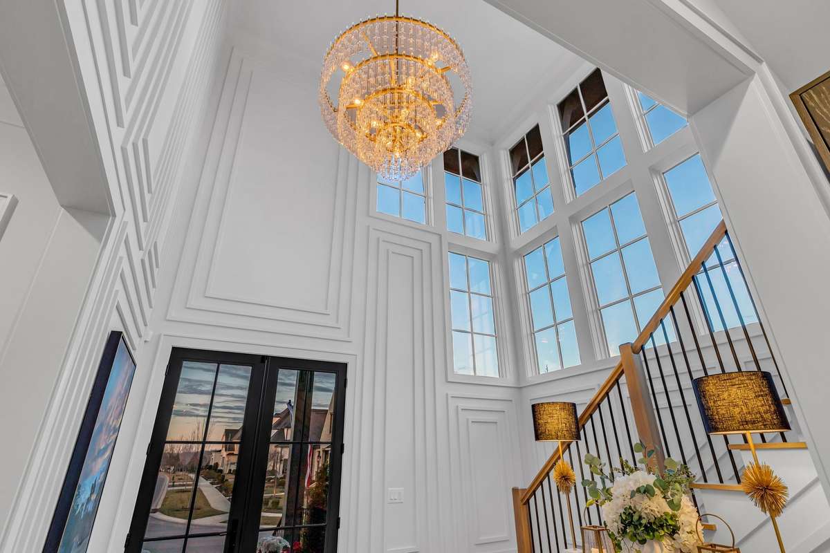 Fantastic Restoration Hardware Chandelier in the 2 Story Entry