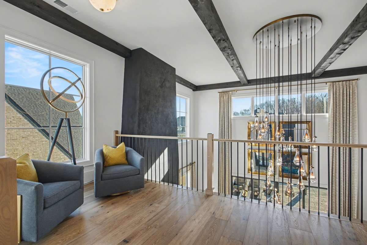 At the Top of the Stairs in the Entry Hall is a Loft Area Overlooking the Great Room/Kitchen