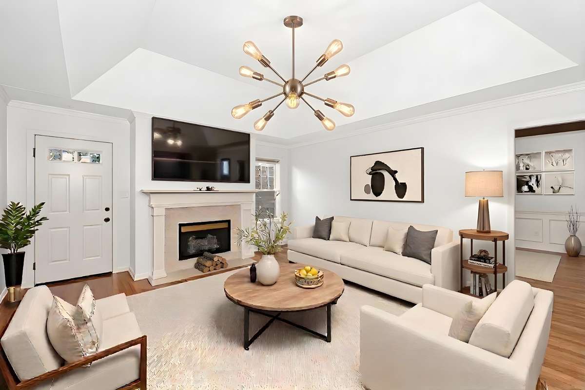 Digitally staged to show what the living room could look like with a modern chic vibe.