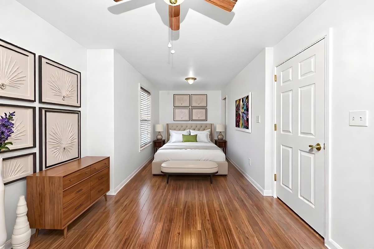 Digitally staged to give you another option for the second downstairs bedroom.