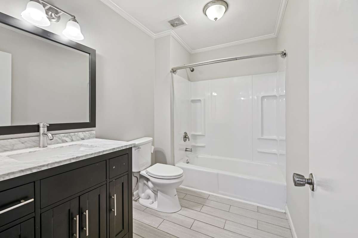 the 2 secondary bedrooms share a large full bath