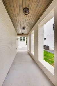 Breezeway to Side Entrance of DADU and Courtyard / Front Door