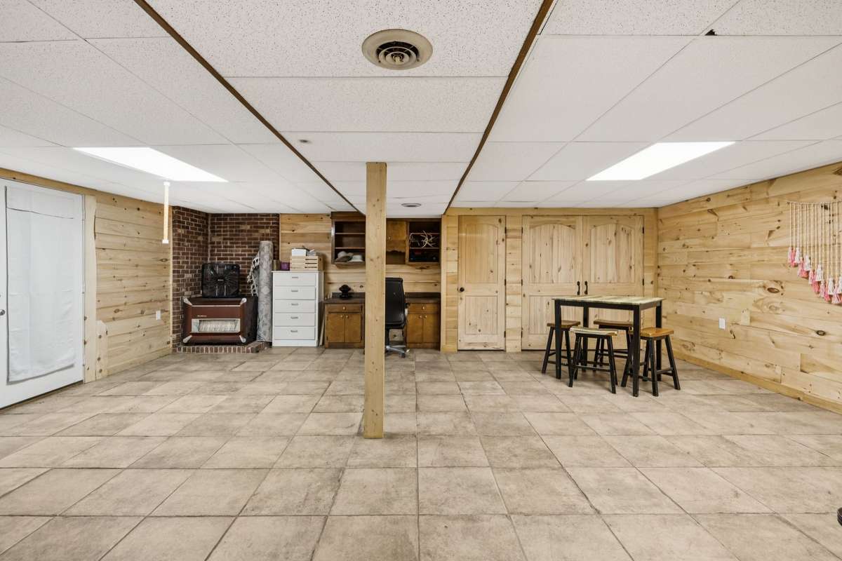 Very large storage closet in basement bonus room