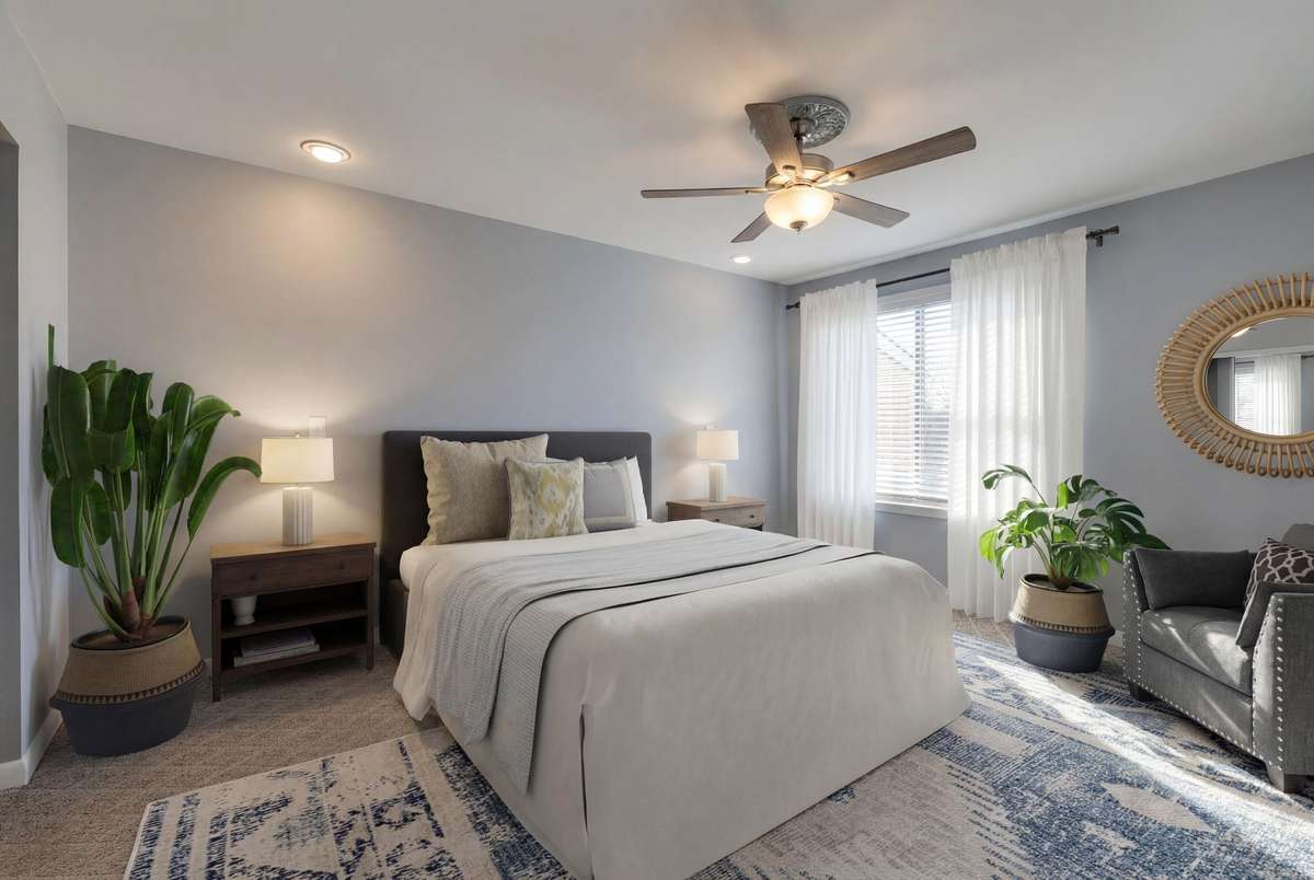 Primary bedroom is staged to show how cozy this can be.