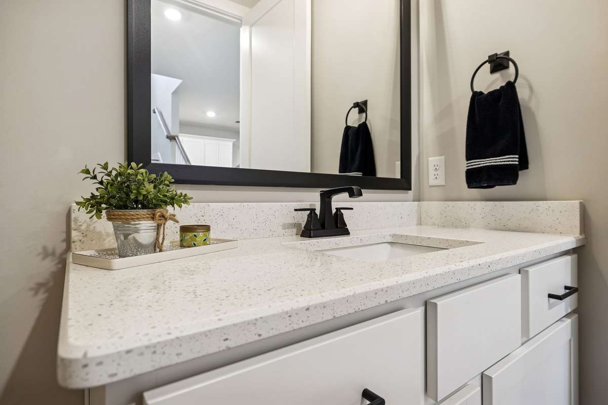 Half bath off of the kitchen and dining area.