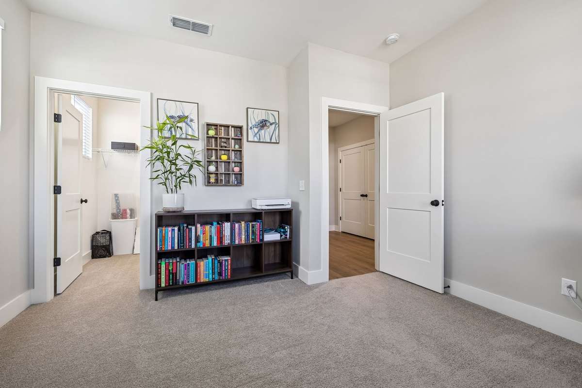 This guest room also has a nice walk in closet.