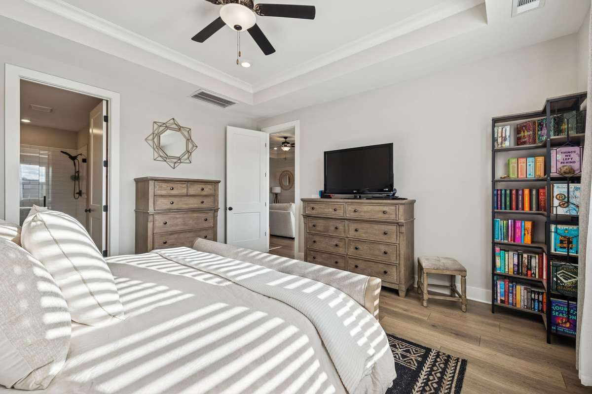 Primary suite is located on the main level, off of the living room.