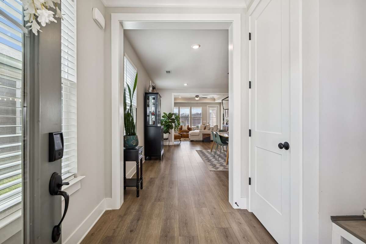 Spacious entry with natural lighting.