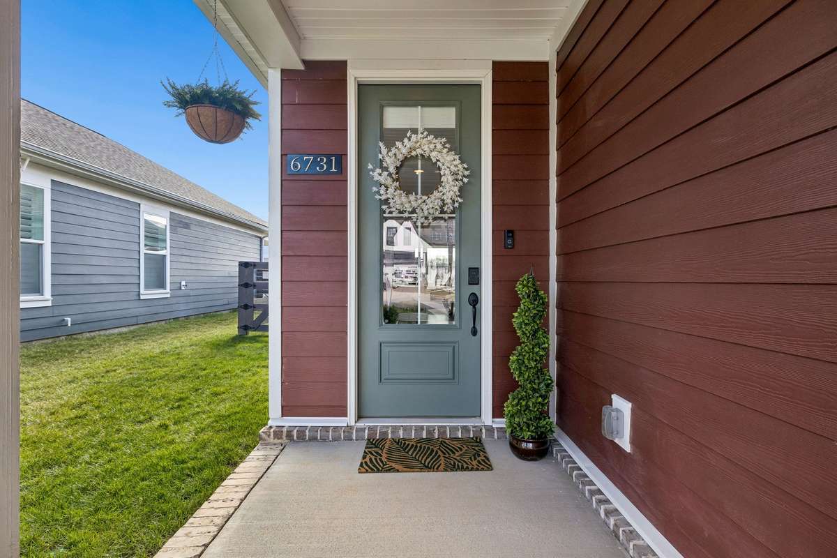 Inviting covered entrance to your new home.