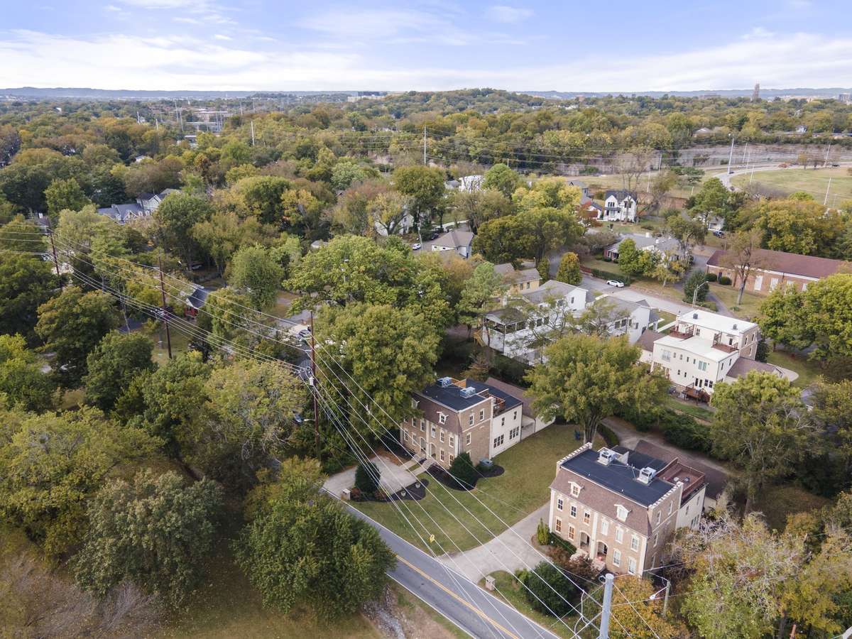 Lots of trees surrounding home