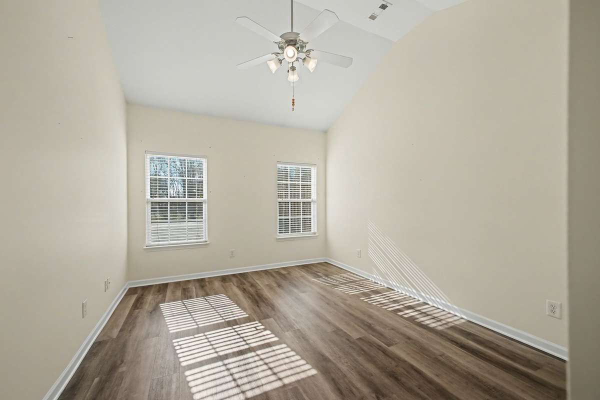11x11 Bedroom with ceiling fan.