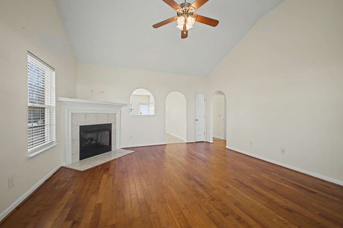Living room opens up to the kitchen/dining area and to the right you can access the two bedrooms.