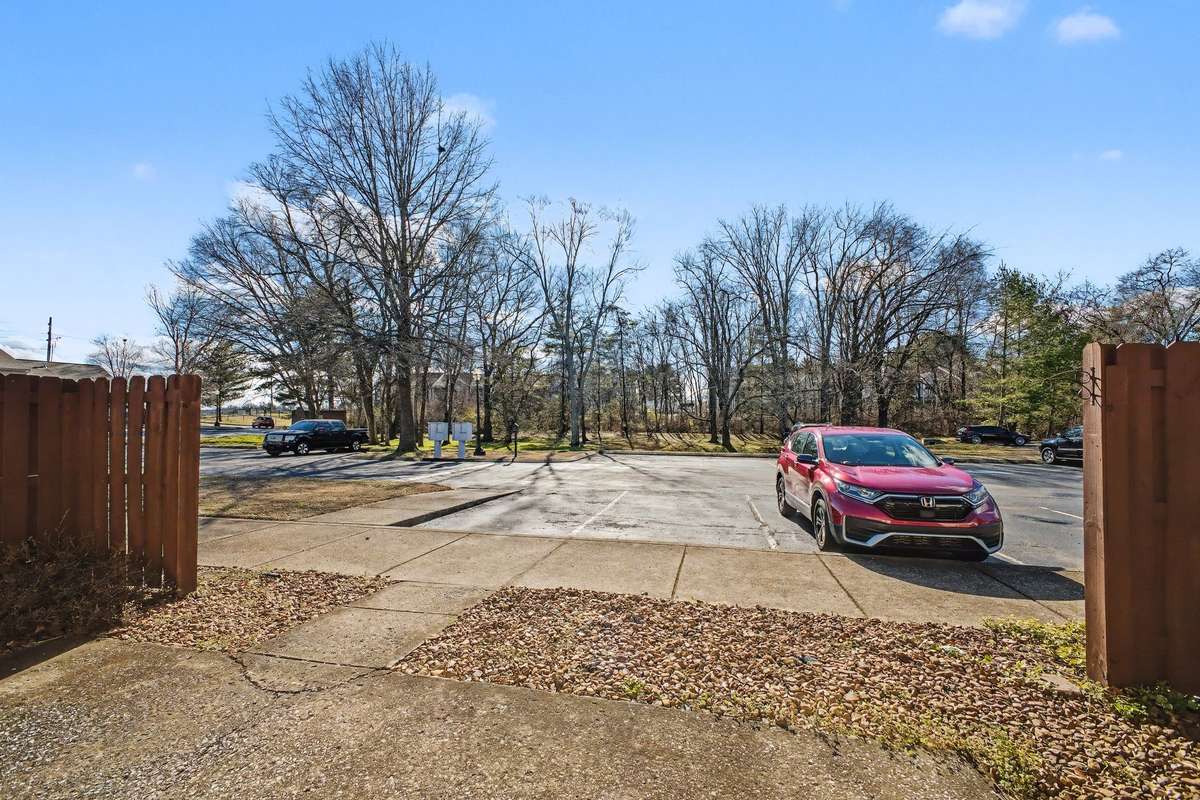 Parking area is paved and level.
