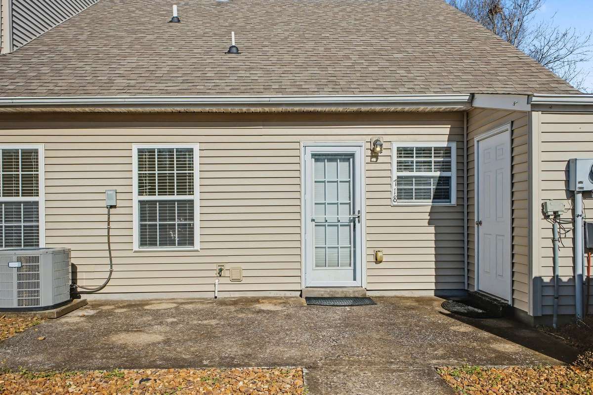 Rear entry to the house.  Storage closet to the right.  Nice size patio