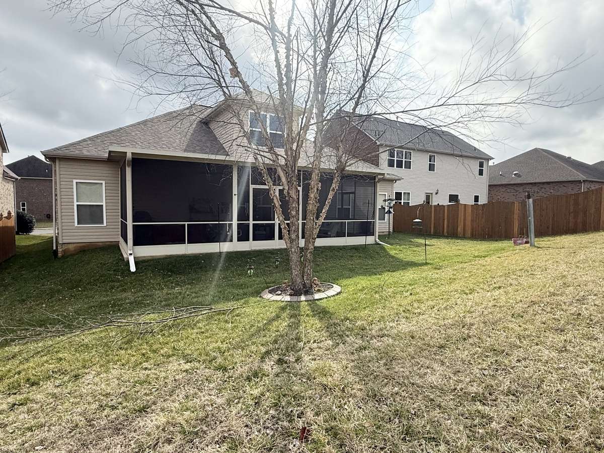 Step outside to the screened-in patio overlooking a private, oversized backyard with no rear neighbors—ideal for relaxing, entertaining, pets, or play—plus a gas line on the patio for your grill.