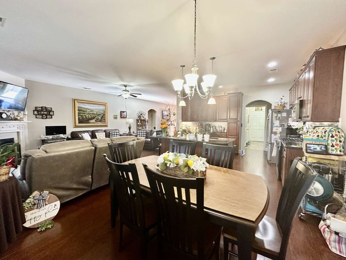 Large Living Room with gas log fireplace; Spacious sitting area through out the home