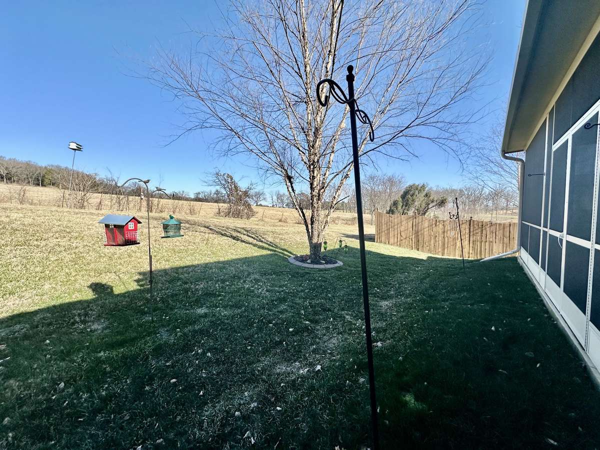 The home also features an irrigation system around the house, a roof that is only 1.5 years old, a current termite contract, and natural gas HVAC for efficient heating. Enjoy community amenities including a pool, clubhouse, and scenic walking areas.
