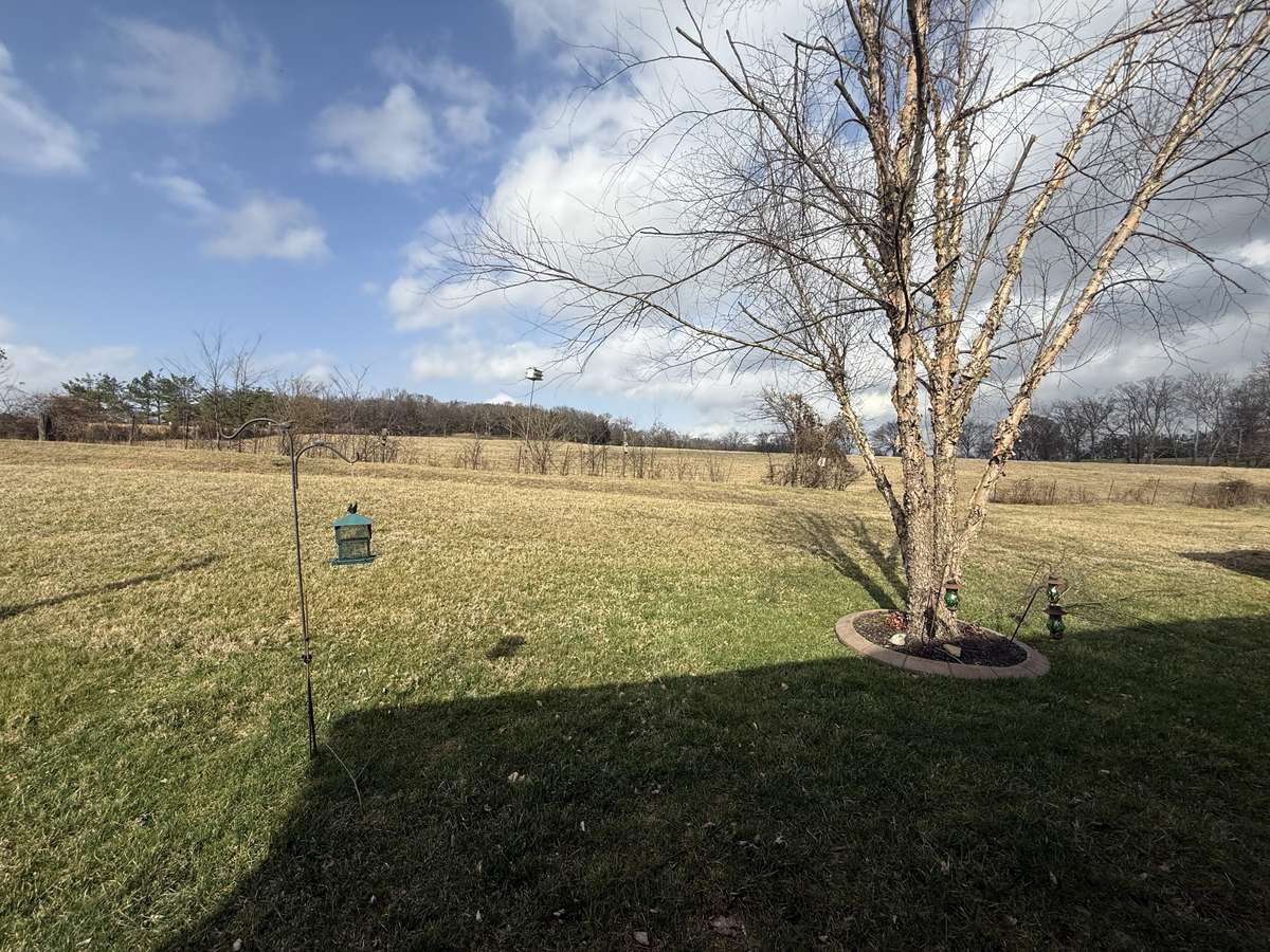 Step outside to the screened-in patio overlooking a private, oversized backyard with no rear neighbors—ideal for relaxing, entertaining, pets, or play—plus a gas line on the patio for your grill.