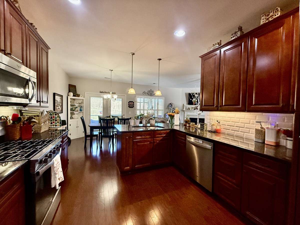 The home also features an irrigation system around the house, a roof that is only 1.5 years old, a current termite contract, and natural gas HVAC for efficient heating. Enjoy community amenities including a pool, clubhouse, and scenic walking areas.