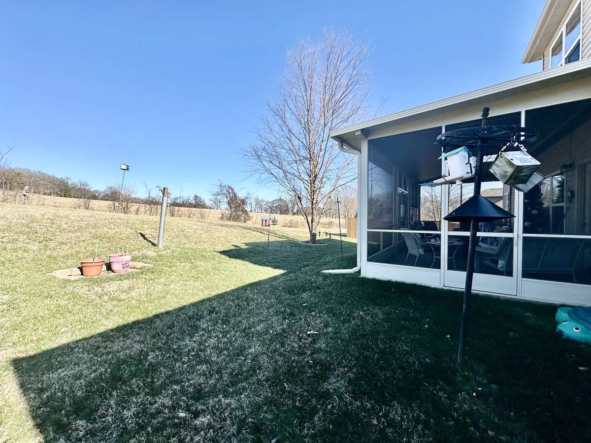 Enjoy mornings or afternoons in the screened porch looking at nature.