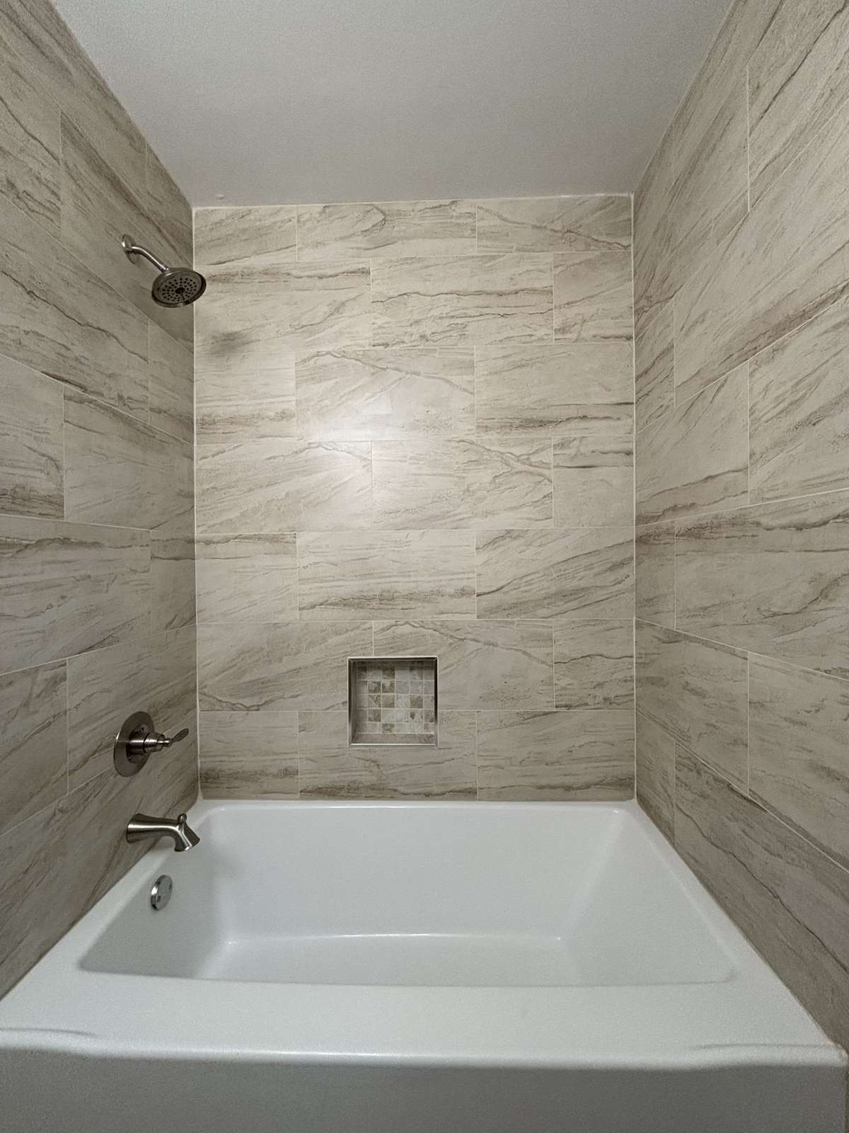 Hall Bath has Tiled Surround