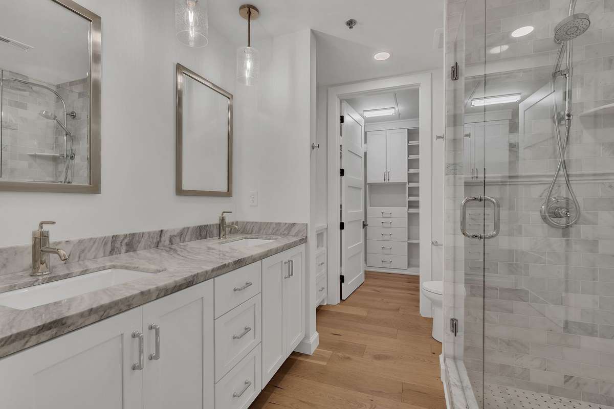 Completely renovated and spacious primary suite with custom California closets